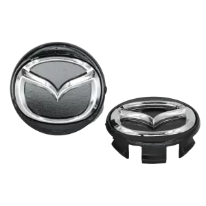 <br><strong>COP052N</strong><br/>COPA RIN DE MAZDA 2 MODELO NUEVO NEGRA LOGO CROMADO